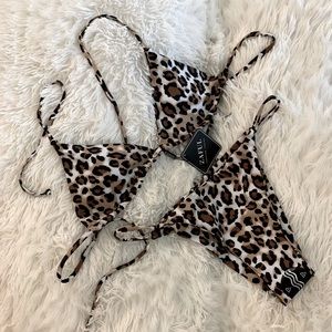 Leopard print string bikini. It is a large on tags but fits medium. Never worn.